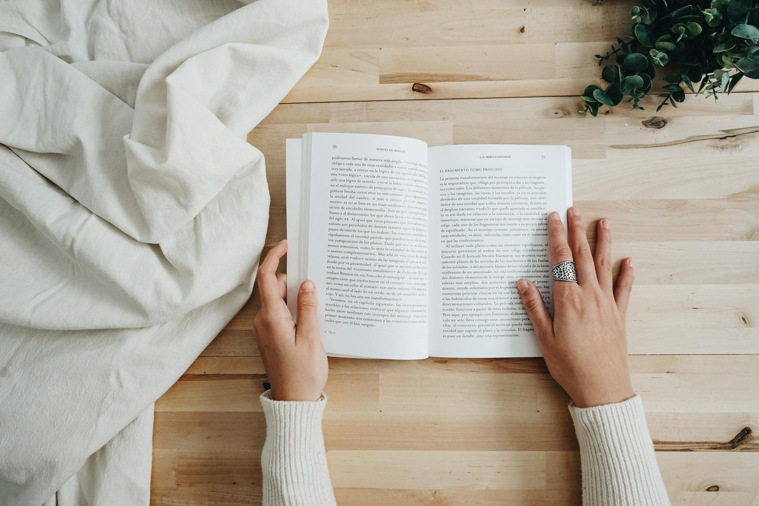 Photo of Person Holding a Book