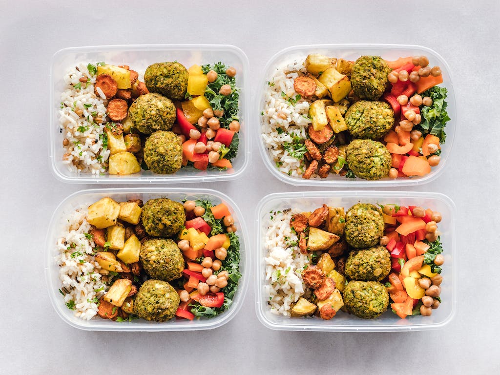 Four identical meals in four meal prep containers